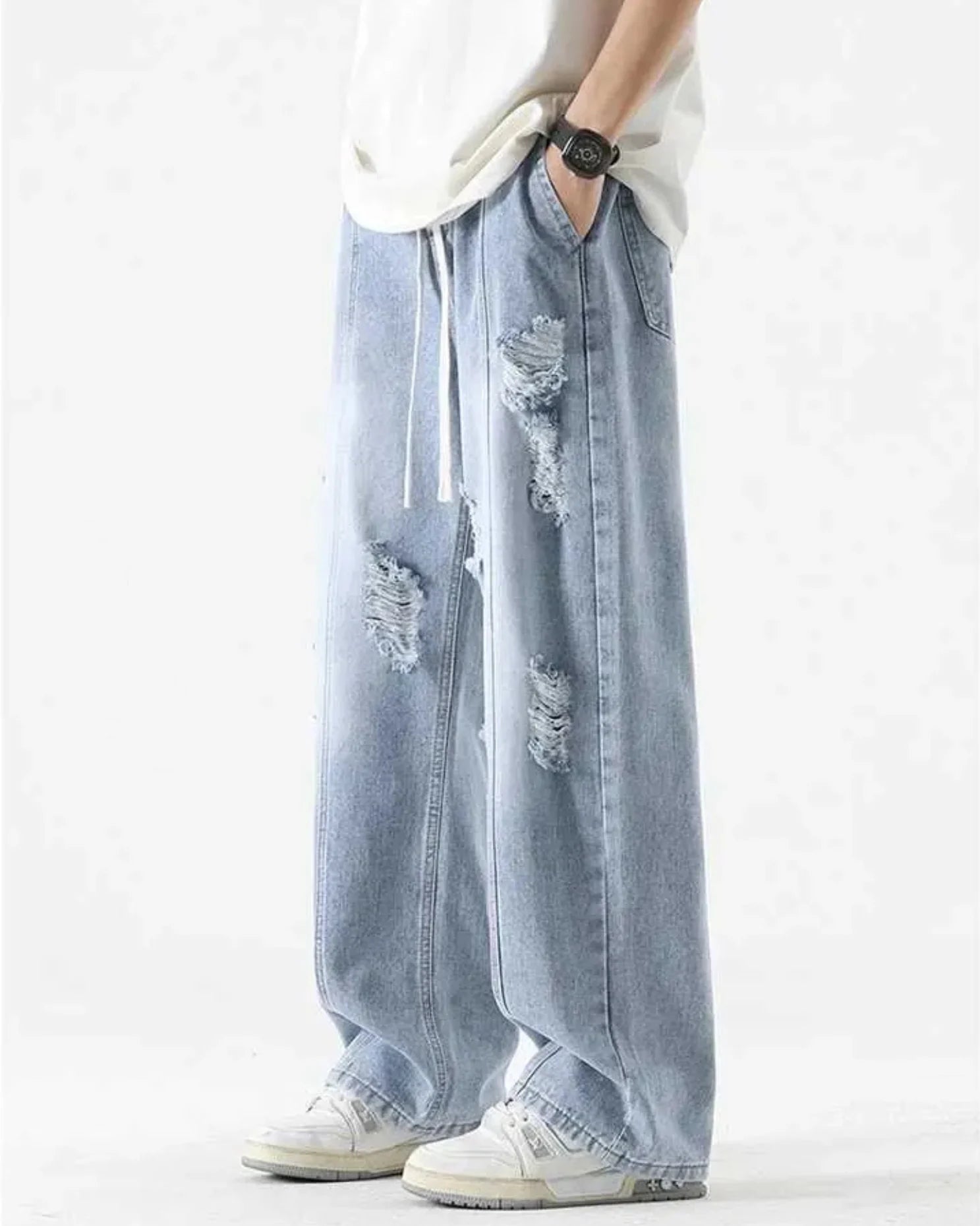 ג'ינס קרעים כחול עם שרוכים “RIPPED”